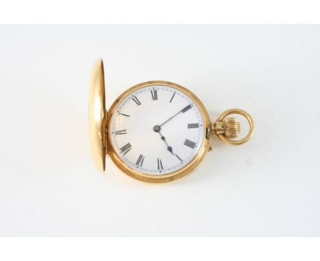 AN 18CT. GOLD HALF HUNTING CASED POCKET WATCH the white enamel dial with Roman numerals, three quarter plate movement, inscri