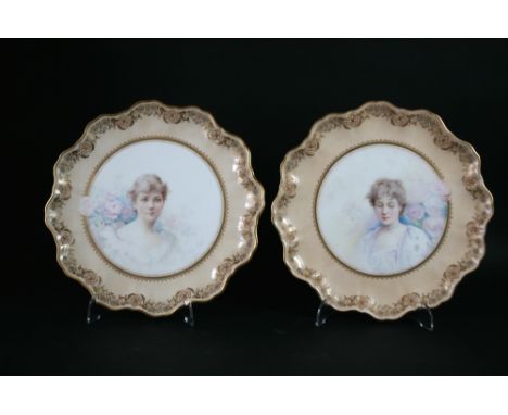PAIR OF SIGNED DOULTON PLATES -  G WHITE a pair of Doulton plates, each painted with a portrait of lady with flowers in the b