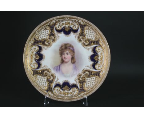 ROYAL DOULTON SIGNED PLATE - VISCOUNTESS ANDORA painted with a portrait of Viscountess Andora, and with a rich gilded border 