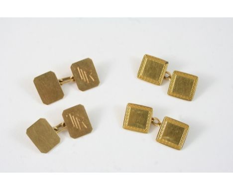 A PAIR OF 18CT. GOLD CUFFLINKS of square form with engine turned decoration, together with another pair of 18ct. gold cufflin
