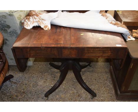 A late Georgian mahogany sofa table with drop ends, turned column and four outswept legs