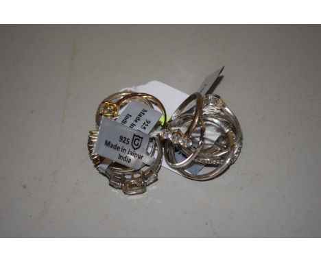 Ten silver and gemset rings: to include an uncut rough diamond ring, topaz, quartz, CZ and others, all stamped 925, 23.1g, (1