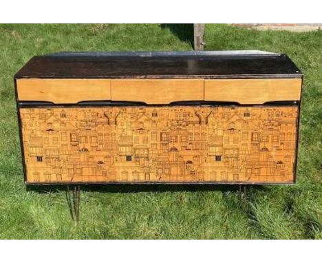 Attributed to Fornasetti Heals London a mid century Sideboard raised on hairpin legs Condition report, very good order  woode