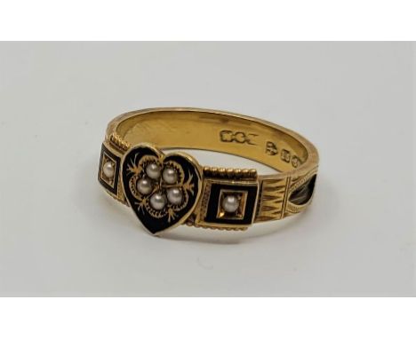 A Victorian 15ct. yellow gold, black enamel and pearl set memorial ring, having black cloissone enamel heart shape plaque set