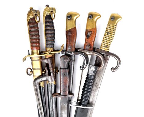 A collection of edged weapons, comprising: French Bayonets (3), Models 1866 and 1874 (2 - one lacking scabbard); a British 19