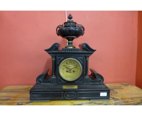 A 19th Century French Belge noir mantel clock