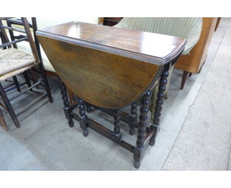 An oak bobbin turned gateleg table