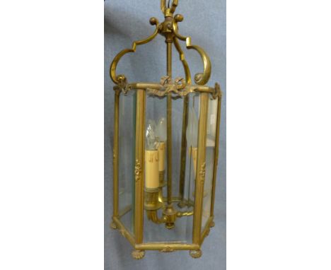 A gilt metal hanging ceiling lantern