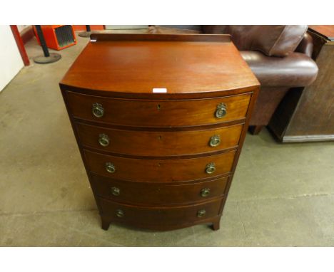 A small George III style mahogany bow front chest of drawers