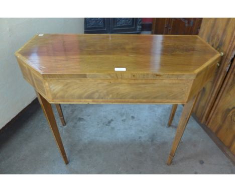 A George IV mahogany fold over card table