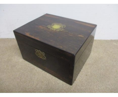 A late Victorian coromandel work box with brass plate escutcheon and part button upholstered interior, 7 x 12