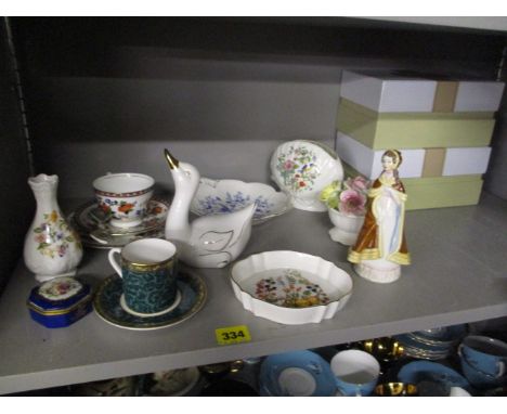 A mixed lot of ceramics to include an Aynsley tea cup and saucer, a Royal Worcester figure, a trinket box, a Coalport flower 