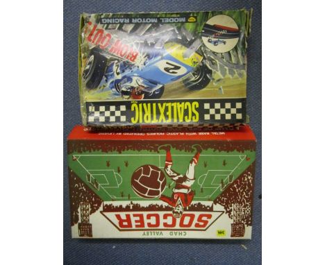 A 1960s Scalextric part boxed set and a Chad Valley soccer game