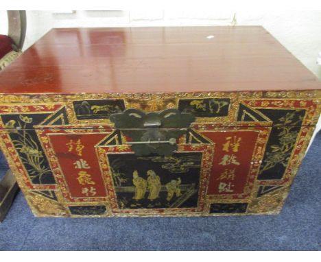 A modern Chinese painted trunk with Chinese characters and figures to the front panel, 16 h x 28 w x 18 d
