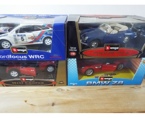 Burago - four 1/18 scale model motor cars, Porsche 356B, Mini Cooper, BMW Z8, and Ford Focus WRC, all appear mint or near min