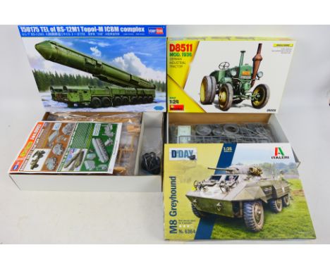 Hobby Boss - Italeri - Miniart - Three boxed plastic military vehicle model kits in various scales. Lot consists of MiniArt #