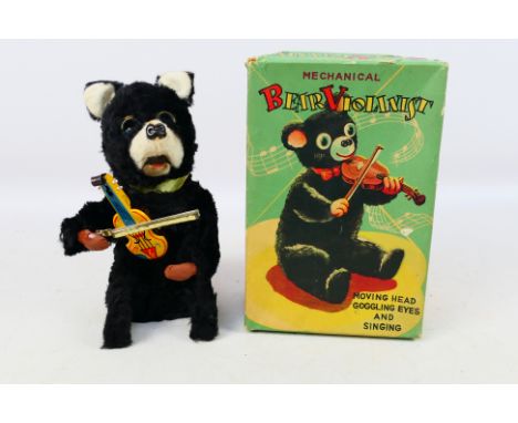 Haji (Japan) - A boxed circa 1950's Haji (Japan) Mechanical Bear Violinist. The bear has some  age related wear and signs of 