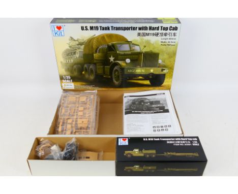 I Love Kit - A boxed #63501 1:35 scale US M19 Tank Transporter with Hard Top Cab plastic model kit from I Love Kit. The kit a