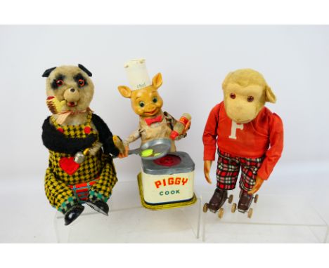 Alps (Japan) - Yonezawa - A collection of unboxed vintage battery operated Japanese tinplate toys. Lot includes 'Frankie the 
