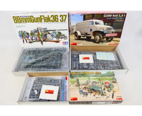 MiniArt - Tamiya - Three boxed plastic military themed model kits in 1:35 scale. Lot consists of Tamiya #35017 German 88mm Gu
