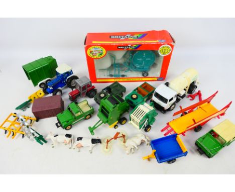 Britains - An assortment of 1/32 scale farm vehicles to include a boxed #09593 Wright rain Irrigation Drum. Also includes var