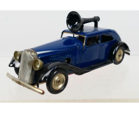 Tri-ang -Minic - An unboxed Minic 29M Traffic Control Car. The car in blue, with metal loudspeaker and two Policeman figures 