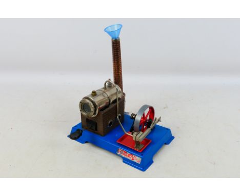 Wilesco - An unboxed Wilesco D5 stationary steam engine. The engine comes with burner, chimney and funnel and appears to be i