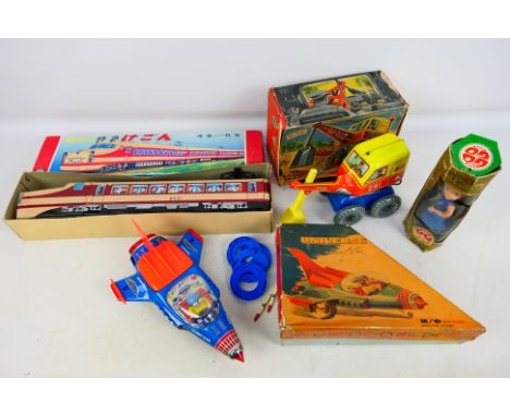 Ichiko - Universe - Others - A boxed group of four vintage plastic and tinplate toys. Lot consists of Ichiko friction powered