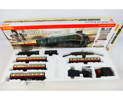 Hornby - A boxed Hornby R1064 OO gauge train set 'The Mallard Express'. The set comes with 4-6-2 Class A4 locomotive 'Mallard