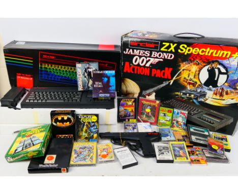 Sinclair - A boxed Sinclair ZX Spectrum +2  'James Bond Action Pack' from the film 'The Living Daylights', with a collection 