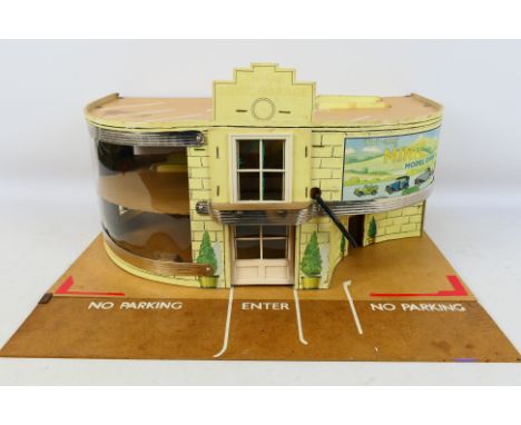 Triang - Minic - A boxed Tri-ang Minic 'A' Garage. The 2-storey hardboard, wood and plastic garage comes with roof sign, fore
