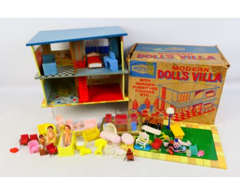 Mettoy - Blue Box -  A boxed Mettoy tinplate Modern Dolls Villa. The villa appears to have some light play wear, and overall 
