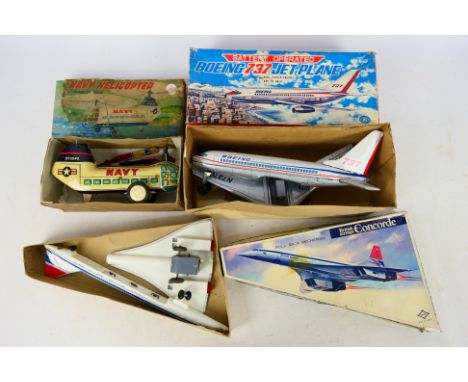 Daiya - Modern Toys - Three boxed vintage tinplate friction and battery operated aircraft. Lot consists of Daiya Navy Helicop