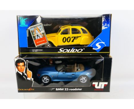 UT Models - Solido - Two boxed 'James Bond' themed 1:18 scale diecast model cars. Lot consists of UT Models #180024336 BMW Z3