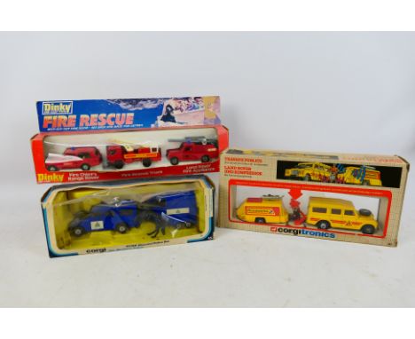 Corgi - Dinky - Three boxed Diecast vehicle sets to include #1007 Road Repair Unit, #45 RCMP Mounted Police Set and #304 Fire