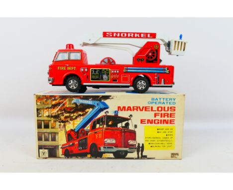 Yonezawa (Japan) - A boxed Yonezawa (Japan) #624 battery operated 'Marvelous Fire Engine'. The model has some light signs of 
