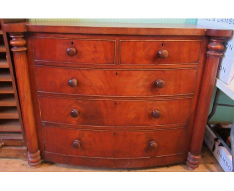 A Victorian mahogany bow front chest of two short over three long graduated draws. 