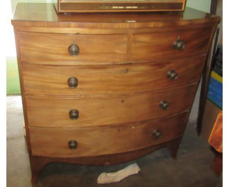 A Victorian mahogany bow front chest of two short over three long graduated draws. 