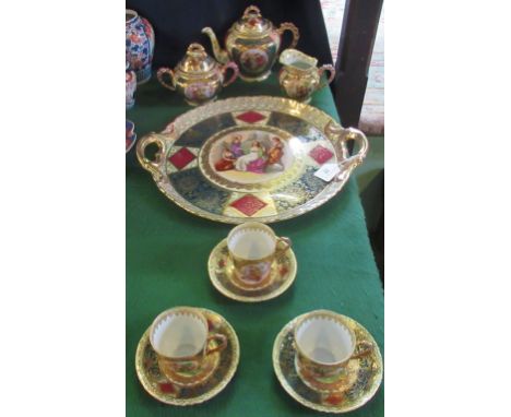 A 20th century Royal Vienna-style tea service, comprising: teapot, twin handled sugar bowl, milk jug, a large twin handed tra