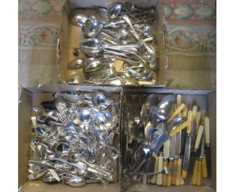 Three boxes containing a large quantity of silver plated flatware. 