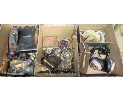 Three boxes containing a quantity of miscellaneous items to include metalware, tape recorder, headphones, wood working tools 