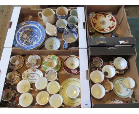 Four boxes containing a large quantity of miscellaneous china to include cabinet cups and saucers, various mugs, blue and whi