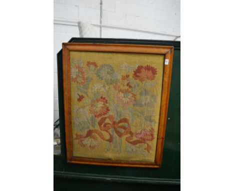A woolwork tapestry picture in a maple frame.