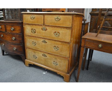 George III walnut straight front chest of two short and three graduated long drawers on bracket feet.