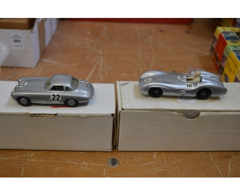 A Crescent toy cast metal model of Mercedes Benz grand prix car and another model of a Mercedes car,