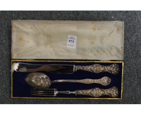 A Continental knife, fork and spoon set in a decorative fitted case.