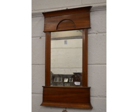 A Continental satin walnut framed mirror.