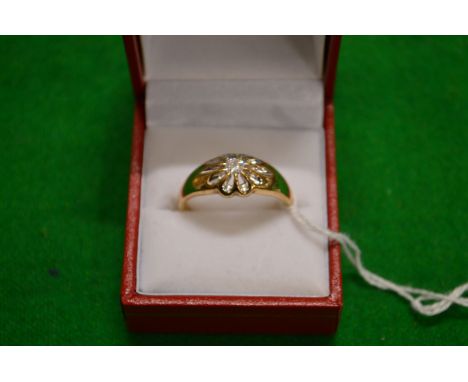 A 9ct gold and diamond ring.