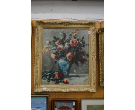 After Renoir, oleographic print of roses in a vase, decorative frame.