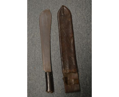 World War II machete with leather scabbard.